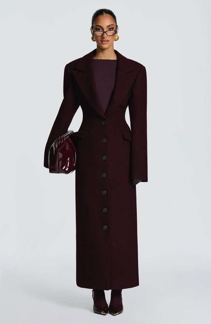 Women's burgundy tailored longline coat with notch lapels and button front
