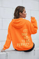 Women's long-sleeve hooded sweatshirt with stacked text graphic on the back