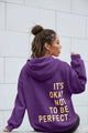 Women's long-sleeve hooded sweatshirt with stacked text graphic on the back