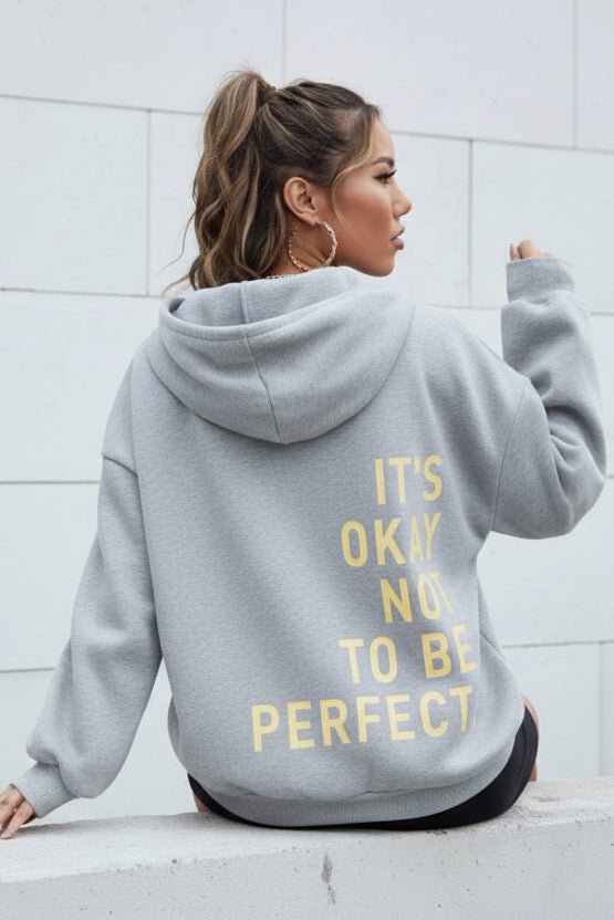 Women's long-sleeve hooded sweatshirt with stacked text graphic on the back