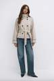Women's belted double-breasted trench coat with high stand collar and cuff straps