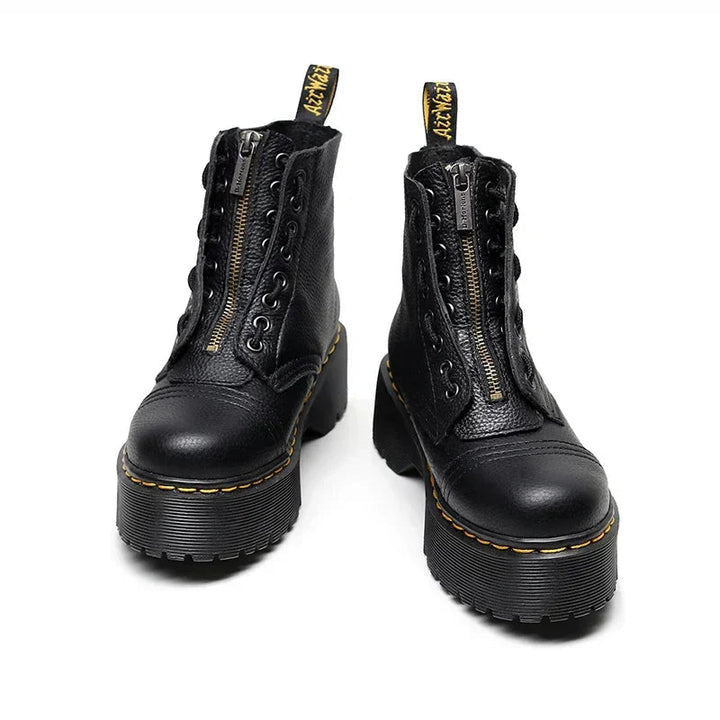 Women's black combat ankle boots with front zipper, laces and chunky platform soles
