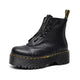 Women's black combat ankle boots with front zipper, laces and chunky platform soles