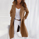 Women's long hooded coat with lapels and button front