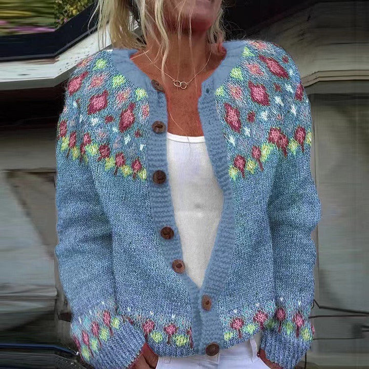 Women's blue floral button cardigan with long sleeves and patterned trims