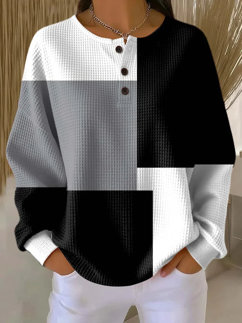 Women's black white and gray geometric color block waffle sweatshirt with button neckline