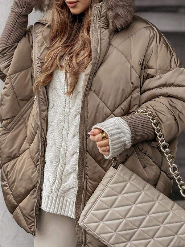 Women's quilted hooded puffer coat with diamond stitching and plush-looking trim