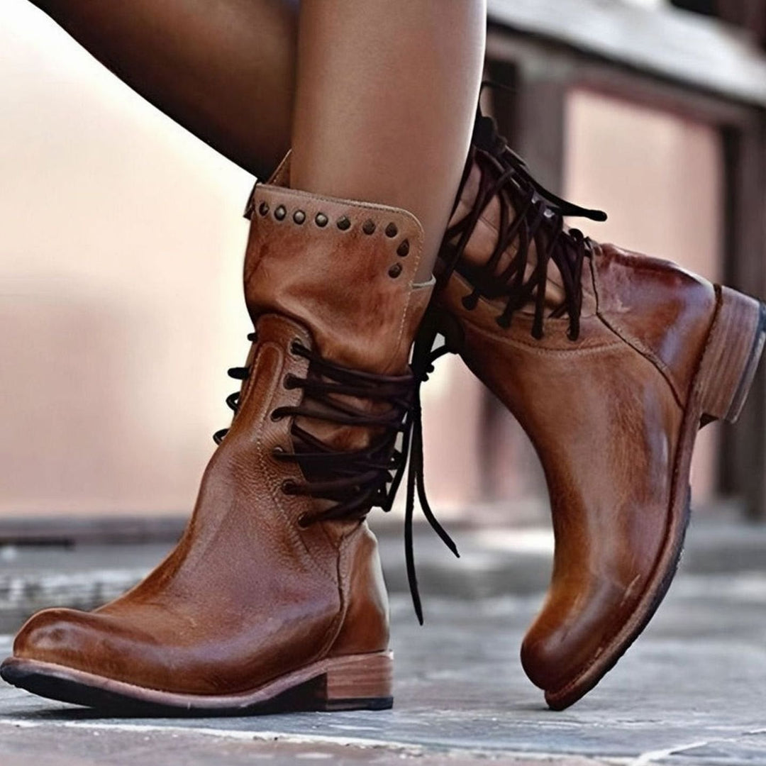Women's lace-up ankle boots with studded ankle trim and low block heels