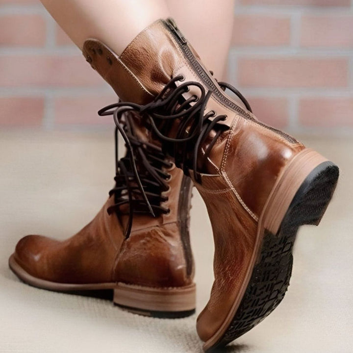 Women's lace-up ankle boots with studded ankle trim and low block heels