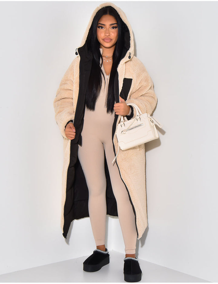 Women's longline reversible hooded quilted jacket shown with fleece-look lining