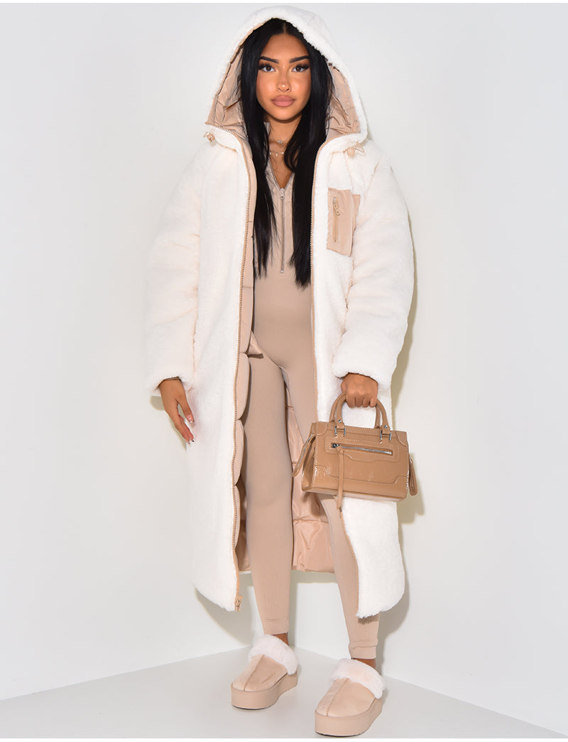 Women's longline reversible hooded quilted jacket shown with fleece-look lining