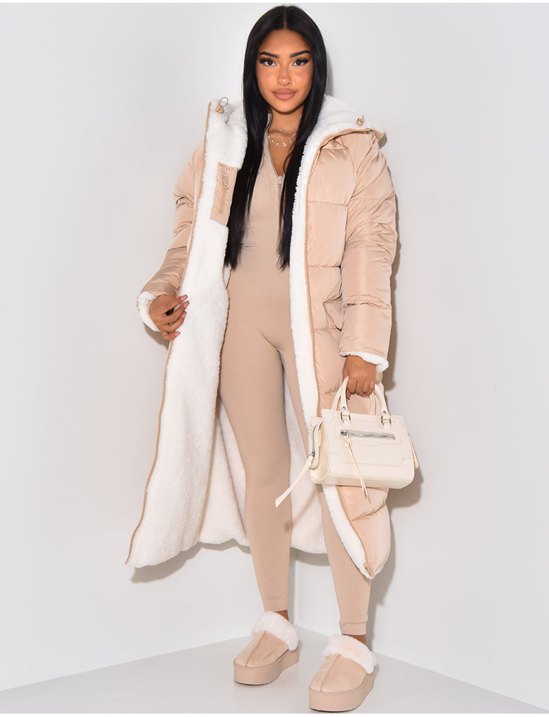 Women's longline reversible hooded quilted jacket shown with fleece-look lining