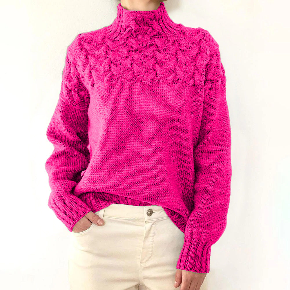Women's cable knit turtleneck sweater with long sleeves and ribbed trims