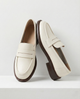 Olive women's penny loafers with round toes and low heels
