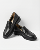 Olive women's penny loafers with round toes and low heels