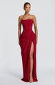Woman wearing strapless ruched maxi dress with high side slit in yellow and navy versions