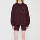 Women's long sleeve crew neck sweatshirt with front graphic detail