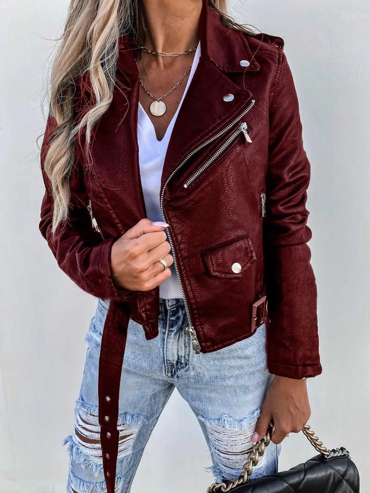 Women's cropped biker jacket with angled zip, belt and multiple pockets