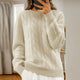 Women's cable knit crew neck sweater with long sleeves and ribbed trims