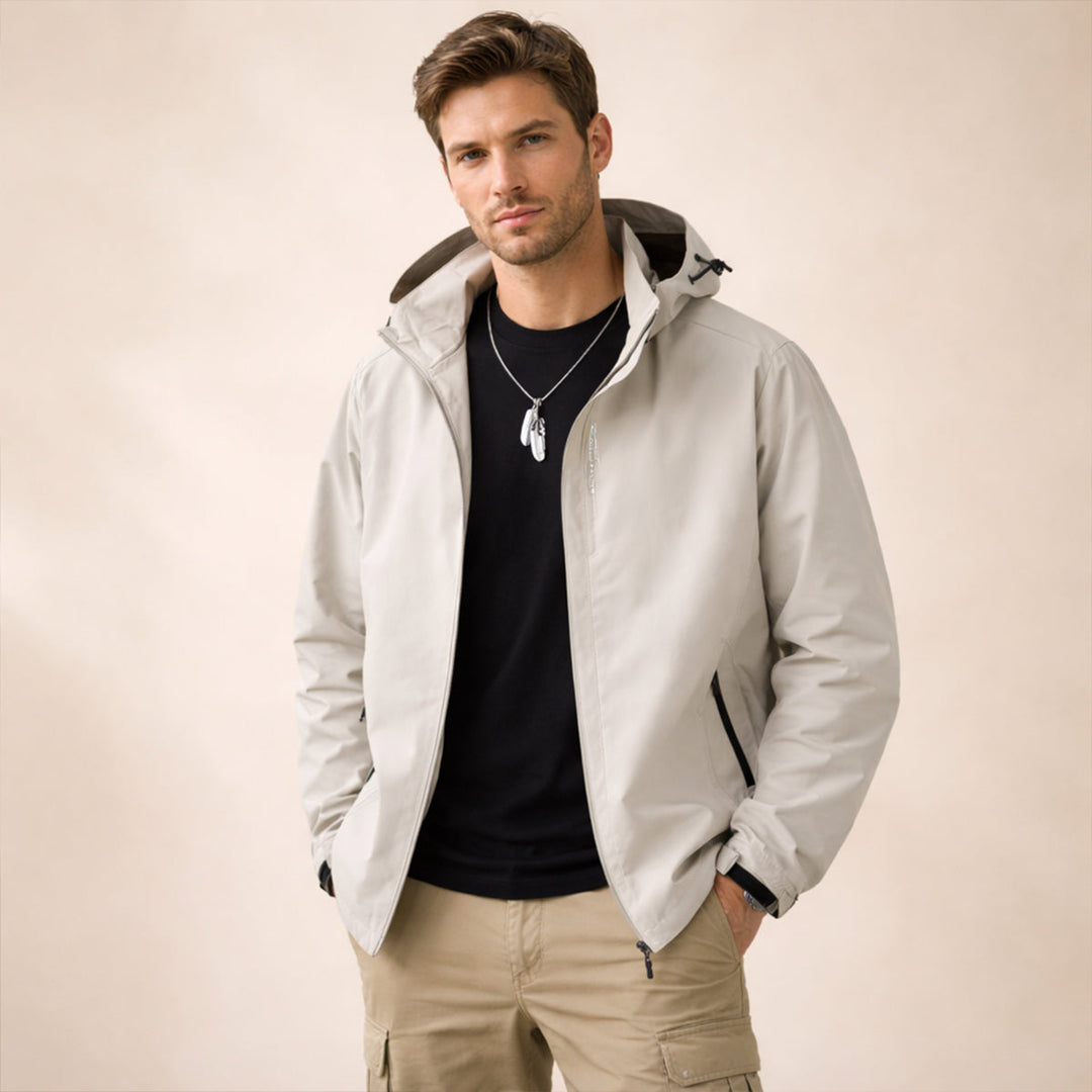 Men's hooded zip front jacket with long sleeves and zipped pockets