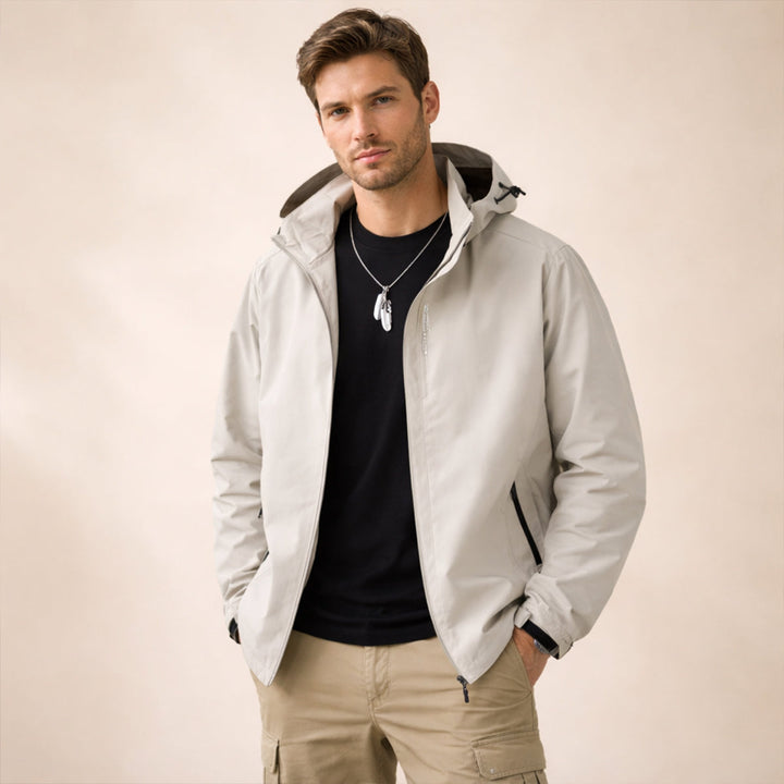 Men's hooded zip front jacket with long sleeves and zipped pockets