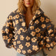 Women's floral fleece sweatshirt with hood, half-zip front and large kangaroo pocket