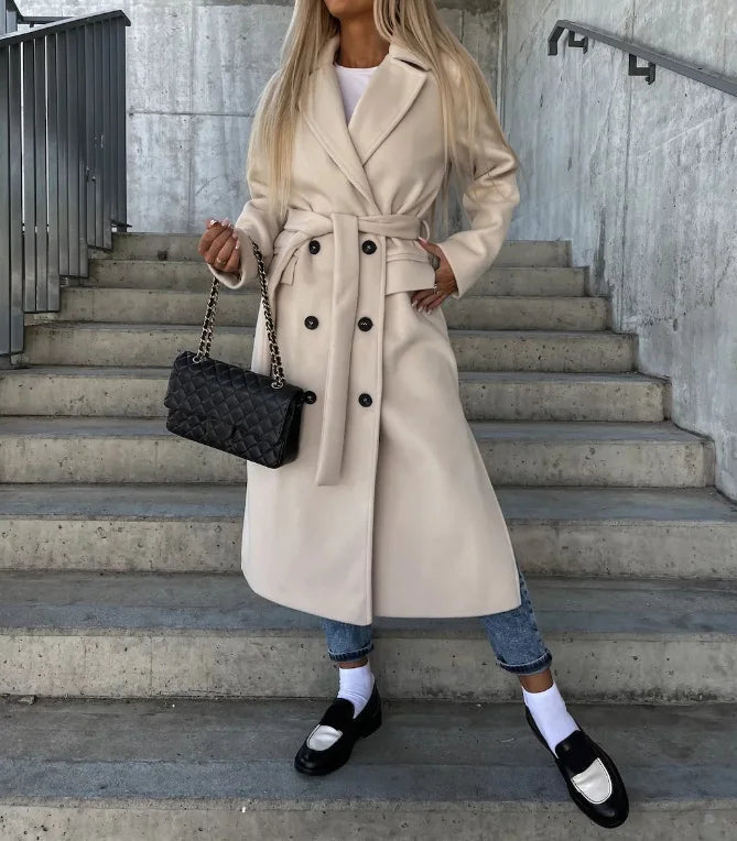 Women's long double-breasted trench coat with belt and lapels