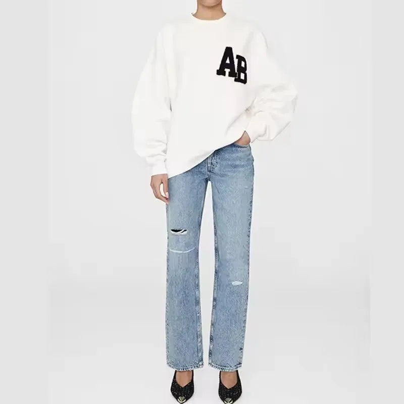 Women's long sleeve crew neck sweatshirt with front graphic detail