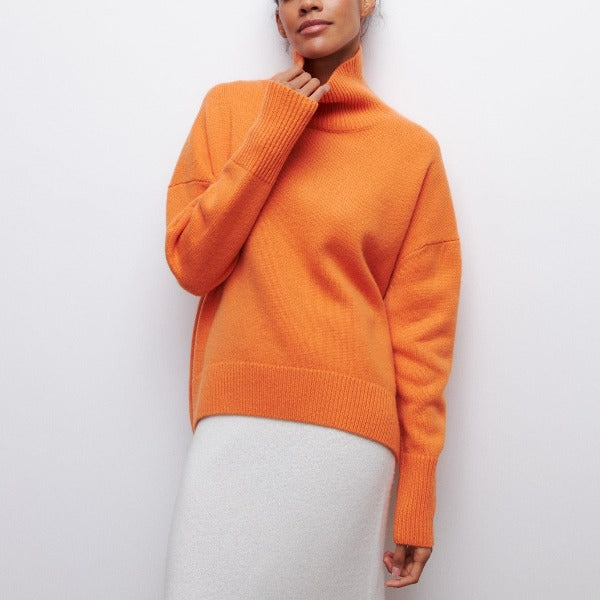 Women's relaxed turtleneck sweater with long sleeves and ribbed trims