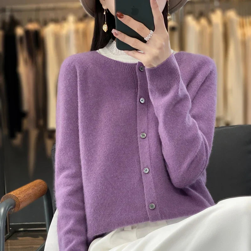 Women's crew neck knit cardigan with long sleeves and button front
