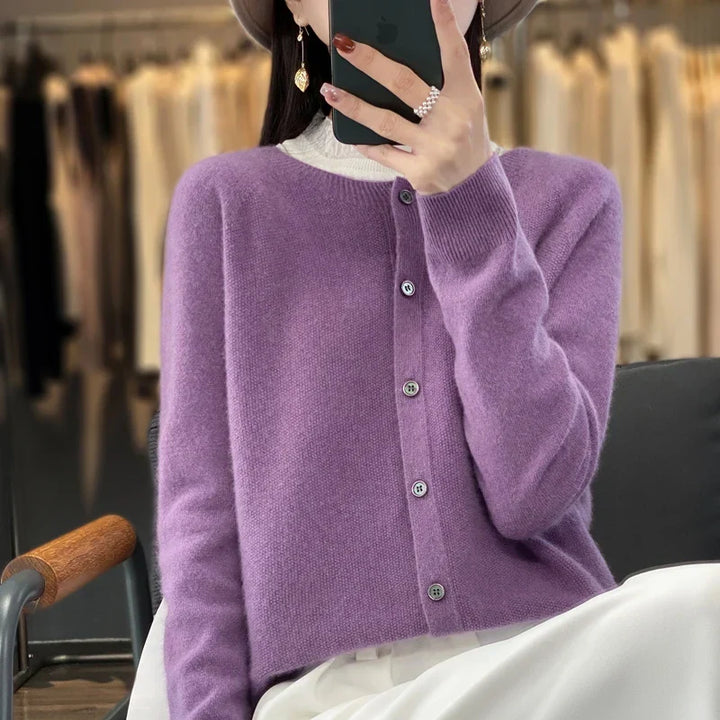 Women's crew neck knit cardigan with long sleeves and button front