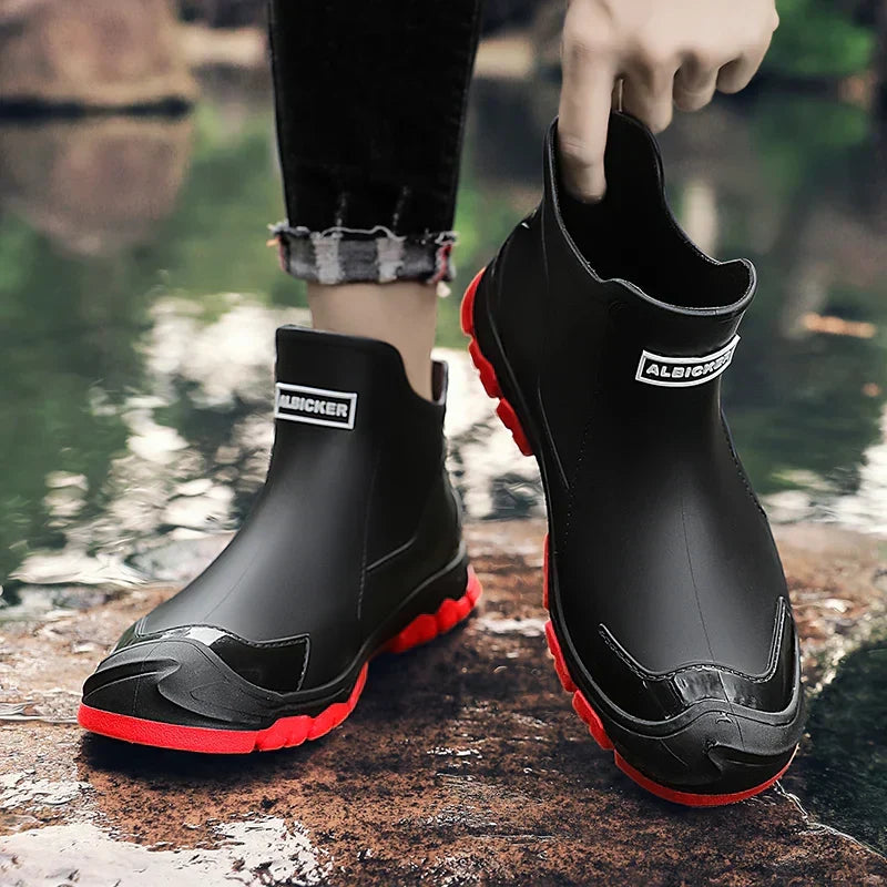 Pull-on terrain ankle boots with stitched panels and chunky textured soles