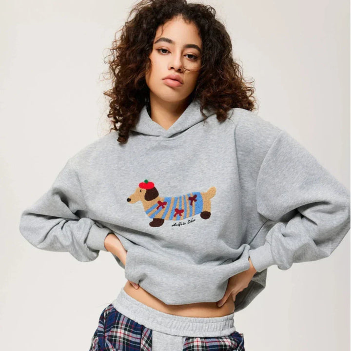 Women's pullover hoodie with dog graphic, hood, long sleeves and kangaroo pocket