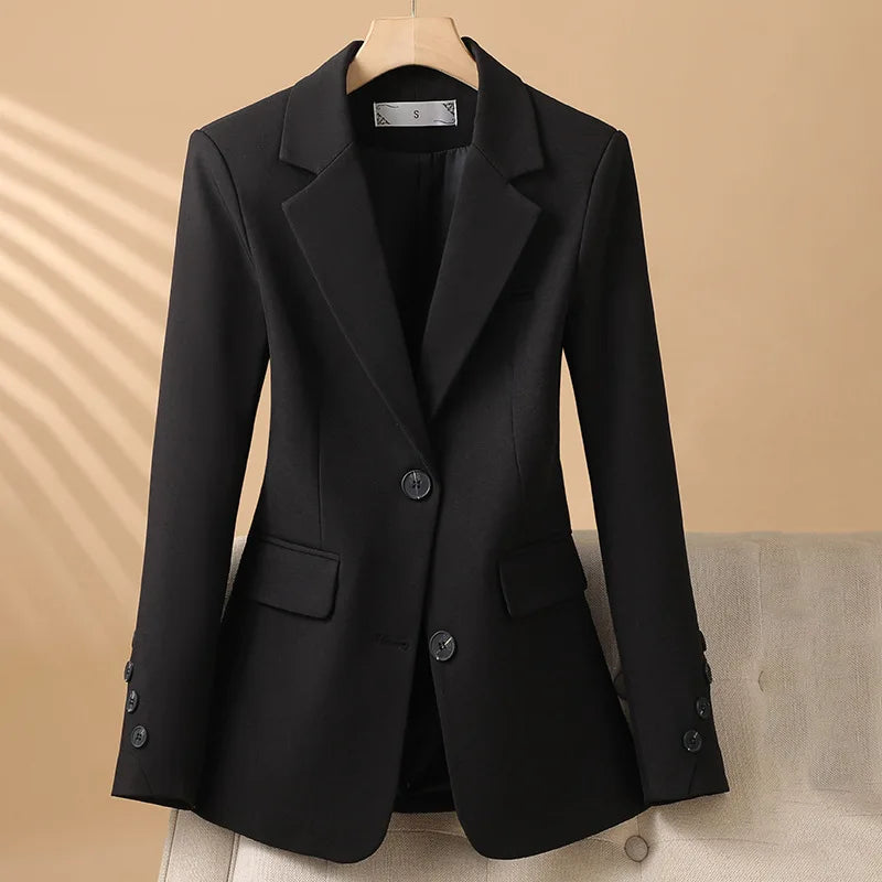 Women's tailored single-breasted blazer with notched lapels and flap pockets