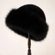 Women's fluffy fur-textured winter hat with rounded crown and wide brim