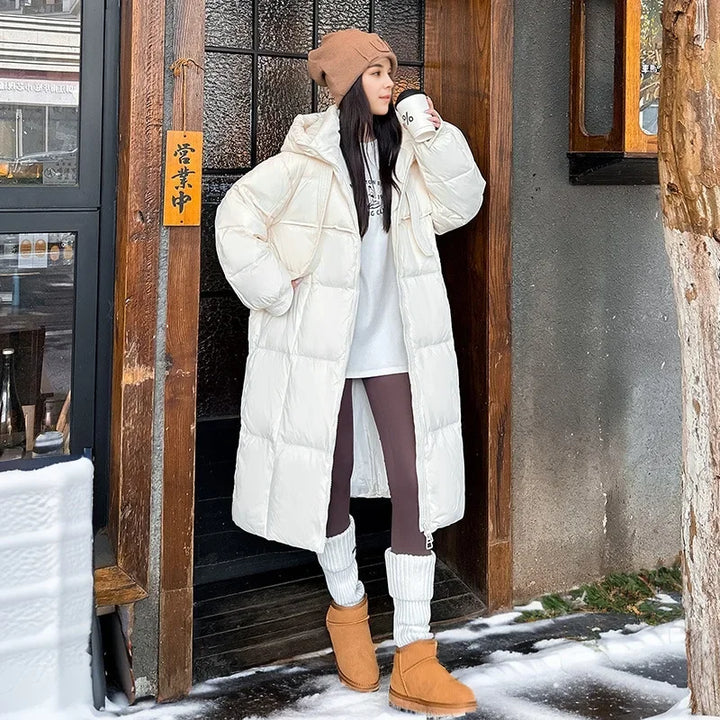Women's long quilted hooded parka jacket with zip front