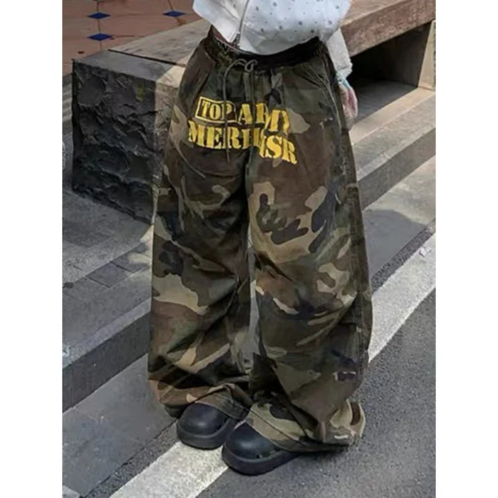 Women's wide leg camouflage trousers with drawstring waist and yellow graphic text