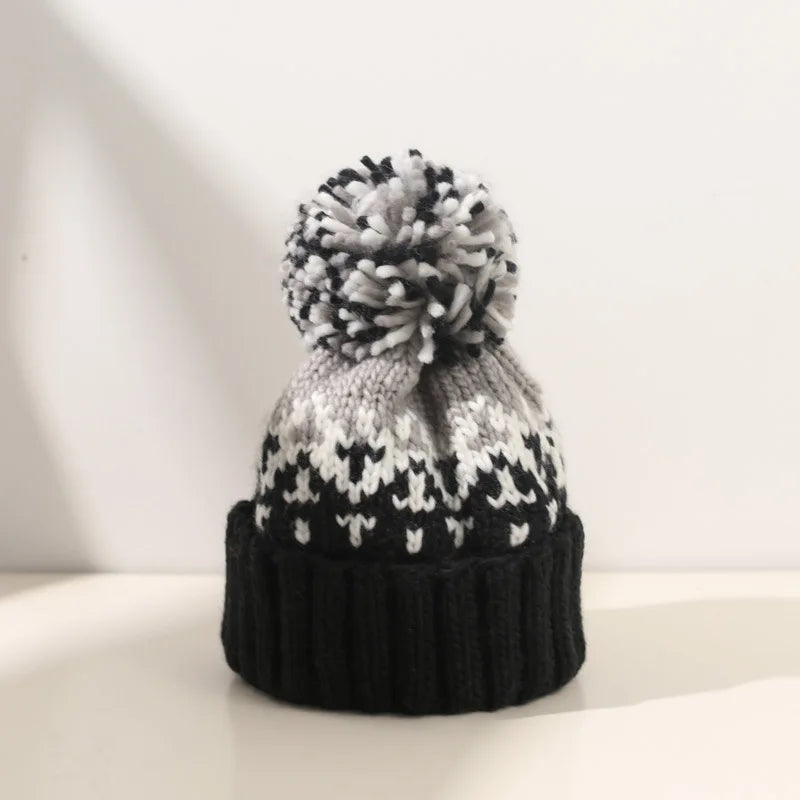 Women's Snowflake Pom Beanie in Black | Bellmere