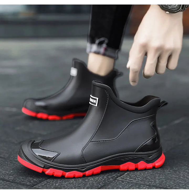 Pull-on terrain ankle boots with stitched panels and chunky textured soles