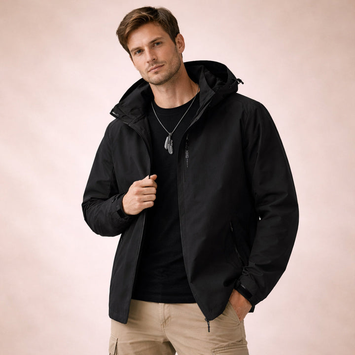 Men's hooded zip front jacket with long sleeves and zipped pockets