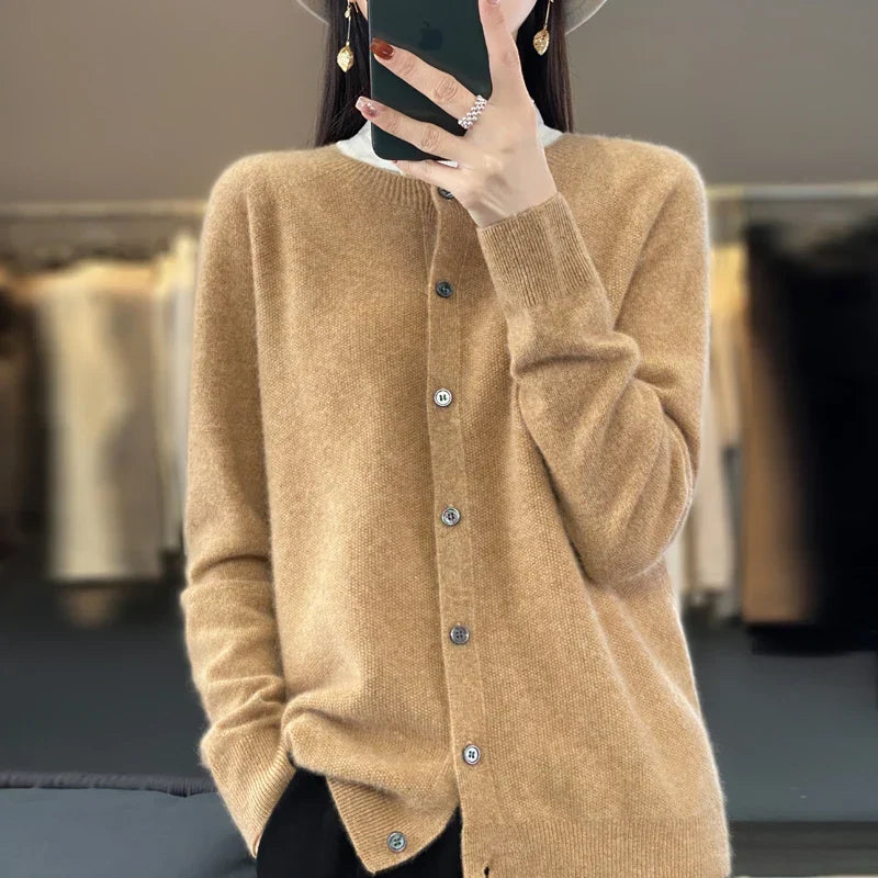 Women's crew neck knit cardigan with long sleeves and button front