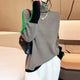Women's herringbone turtleneck sweater with long sleeves and contrast trim