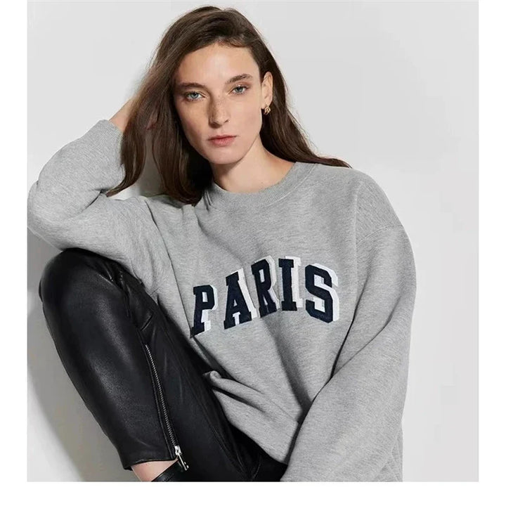 Women's long sleeve crew neck sweatshirt with front graphic detail