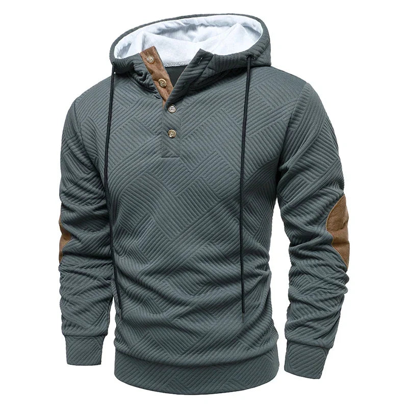 Men's textured hooded pullover with button placket and contrasting elbow panels