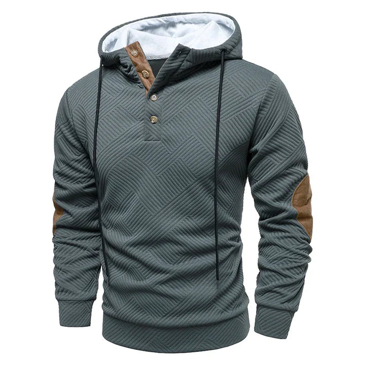 Men's textured hooded pullover with button placket and contrasting elbow panels