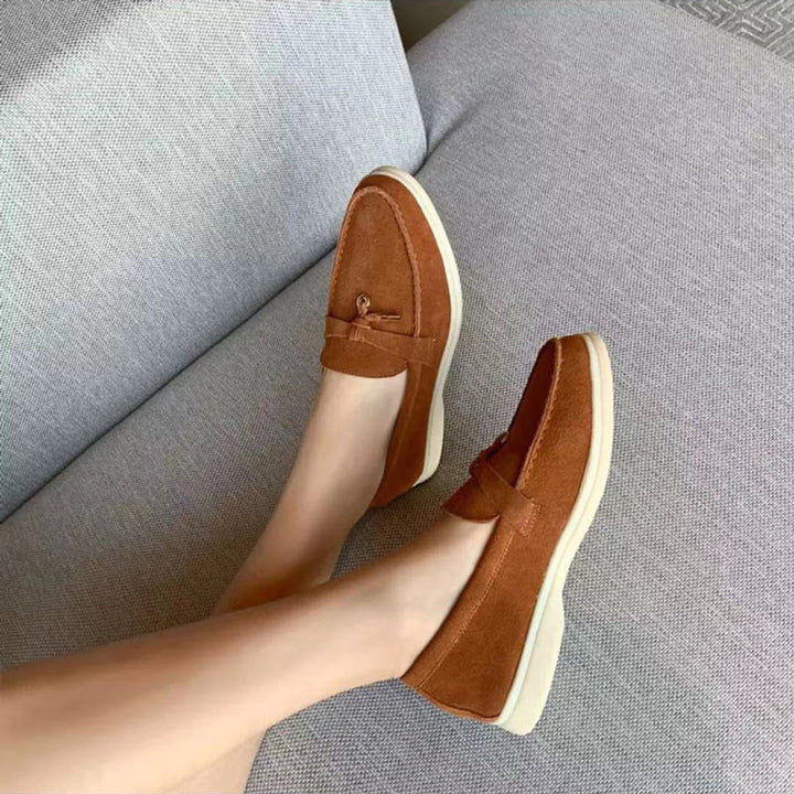 Women's pointed toe loafers with tassel detail