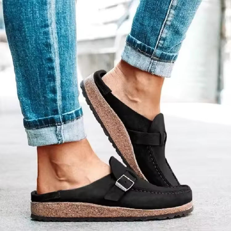 Women's slip-on loafers with buckle straps, rounded toes and flat soles