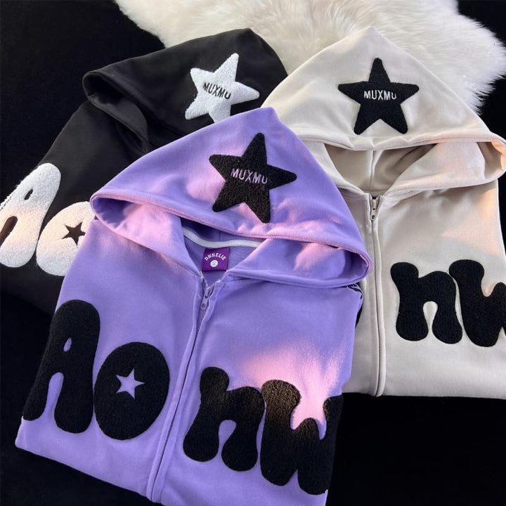 Women's hooded zip-up hoodie with raised text appliqués, star patches and kangaroo pocket