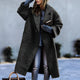 Women's long oversized lapel coat with button front and angled pockets