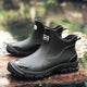 Pull-on terrain ankle boots with stitched panels and chunky textured soles